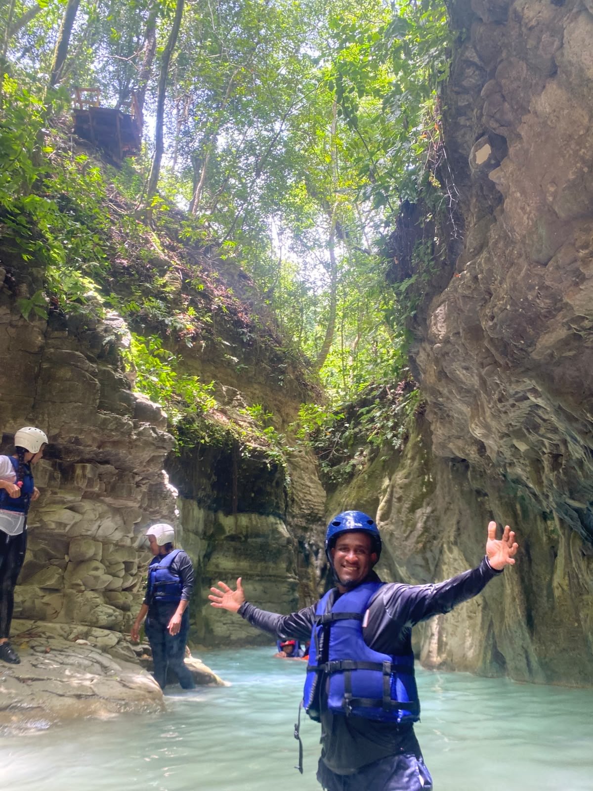 Canyoning excursion between rock walls