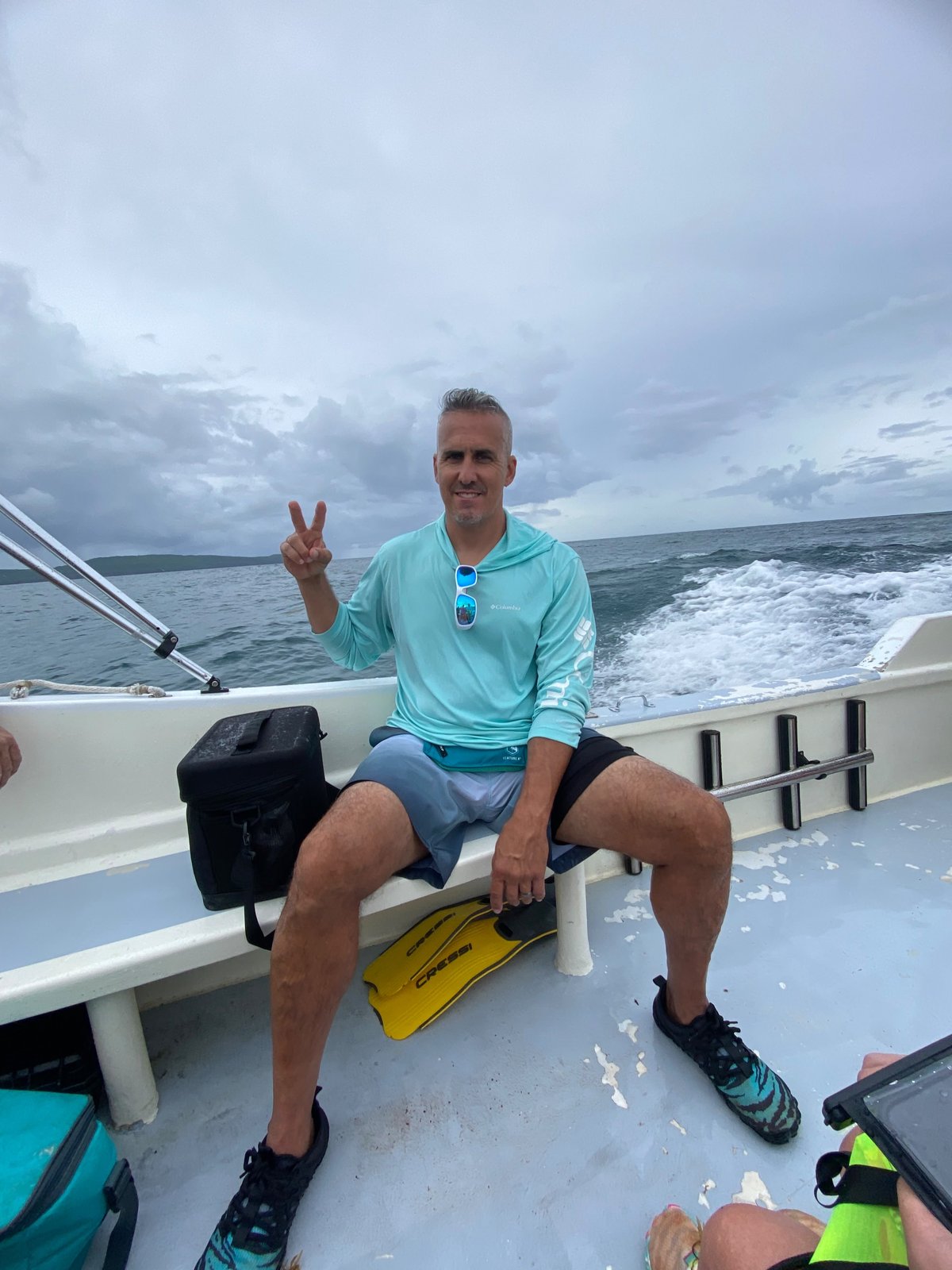 Diver ready with fins on the boat