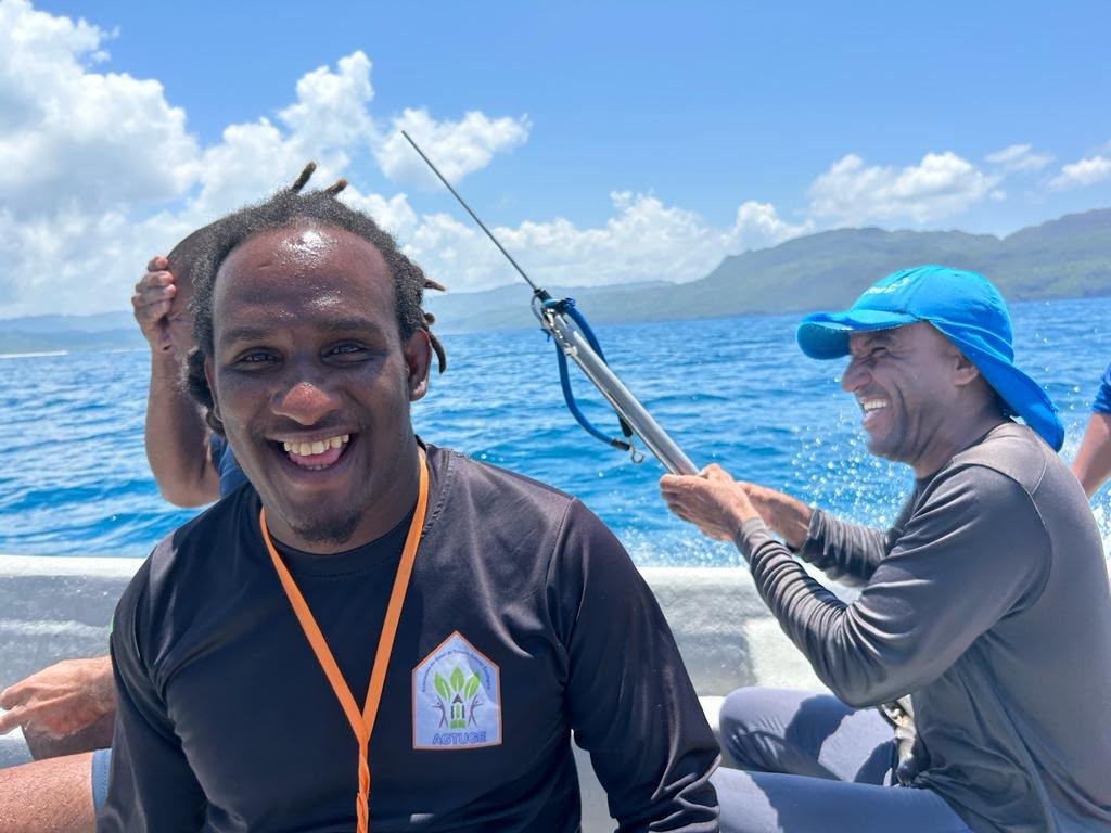 Fishing guide on the boat with rod holder