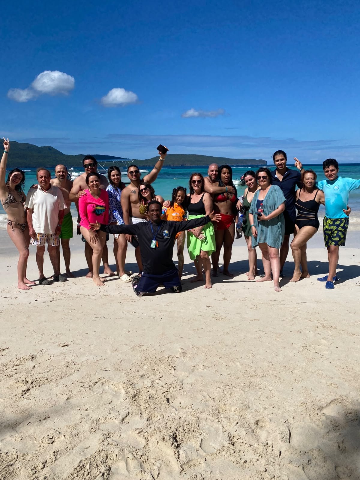 Large group of guests on the beach