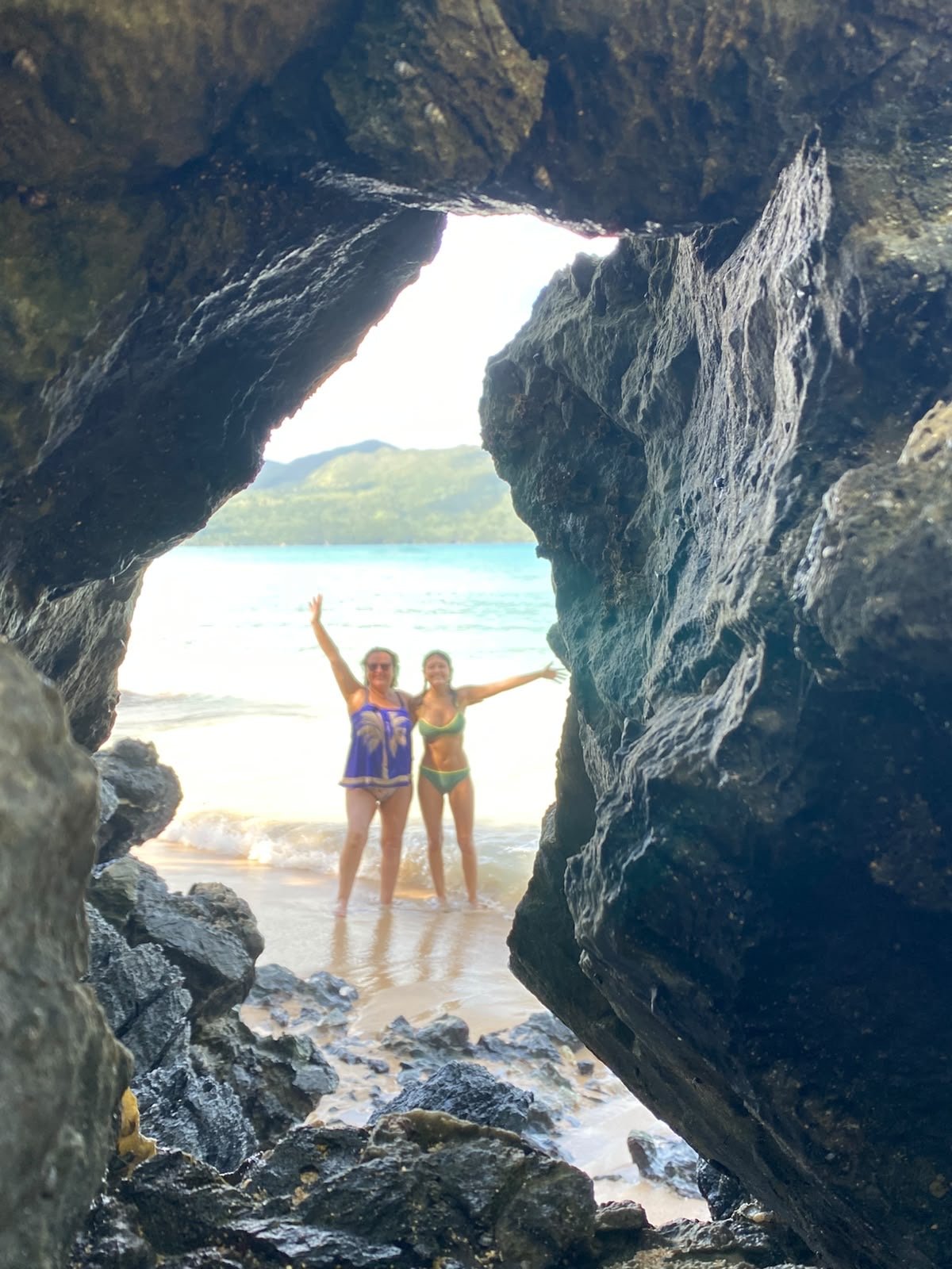 Beach seen through a rock formation