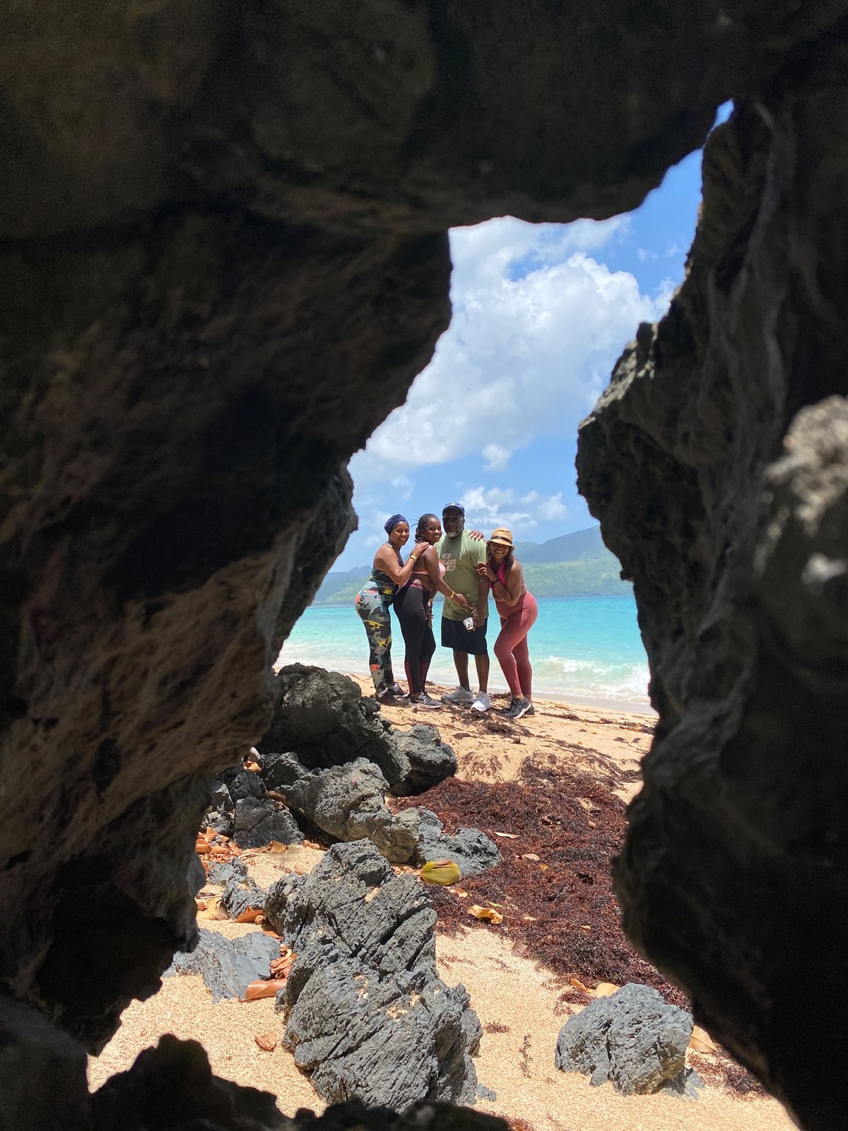Seven Beaches trail, virgin beach seen through a rock arch